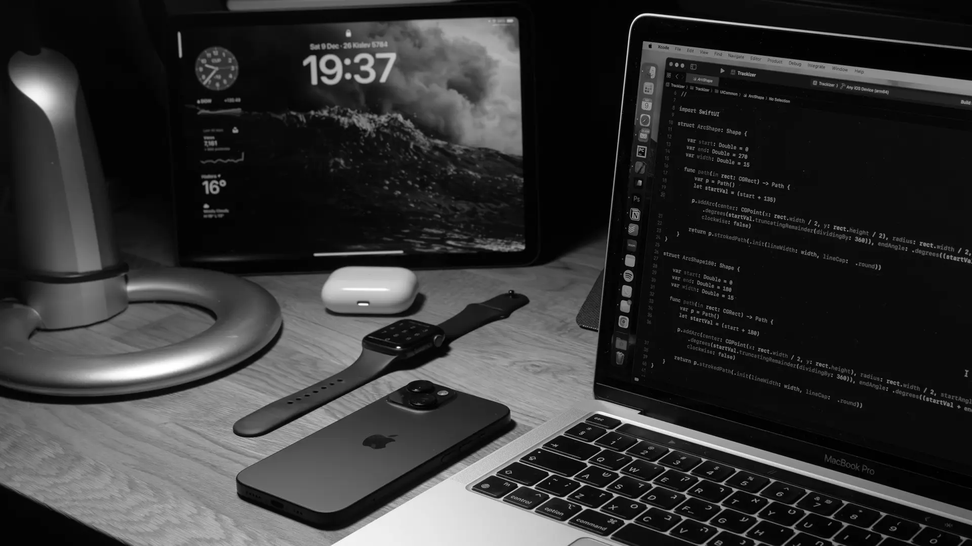 Website design and code on a desktop screen